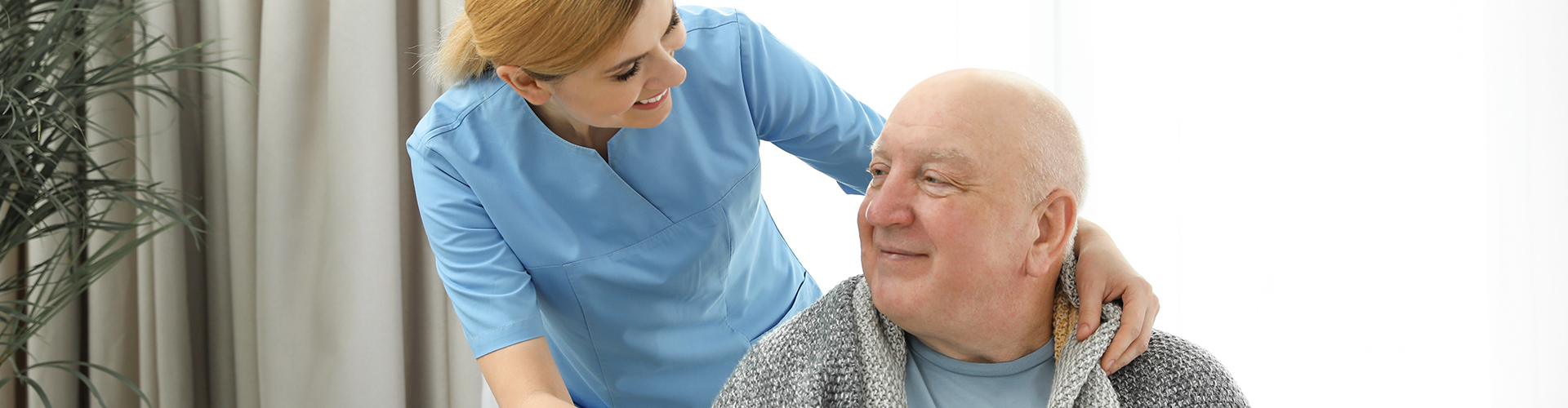caregiver assisting a patient